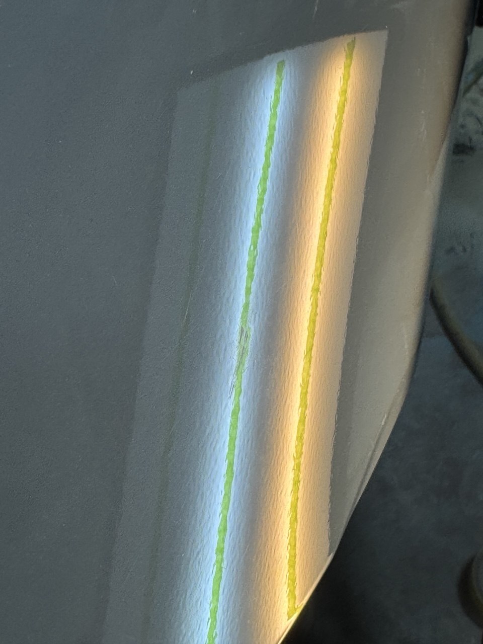 Silver panel during paintless dent repair